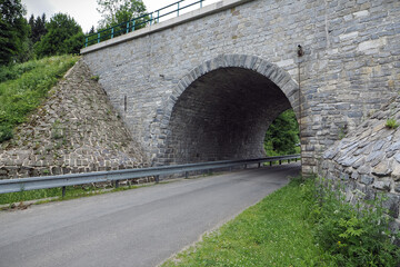Fototapeta na wymiar Stone bridge for train crossing.