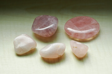 Pink stone lying next to each other.
