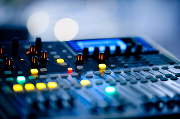 sound check for concert, mixer control, music engineer, backstage 
