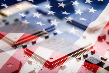 American microelectronics. USA national flag and electronic printed circuit board. Modern...