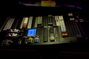 Fototapeta na wymiar sound check for concert, mixer control, music engineer, backstage 