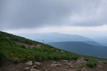 beautiful mountain landscape fog and clouds on the top of the mountains