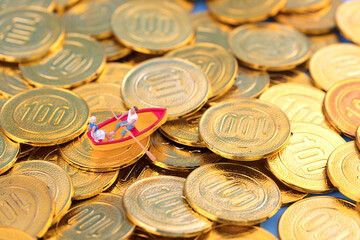 Boating in the ocean of miniature creative gold coins