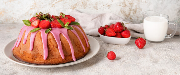 Tasty strawberry cake on grunge background