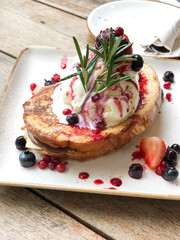 Delicious homemade french-toast ice cream with mutl berries fruits