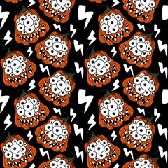 Halloween seamless monster pumpkins with eyes pattern for wrapping paper and fabrics and accessories and kids