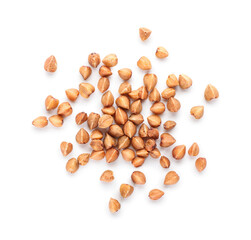 Buckwheat grains scattered on white background
