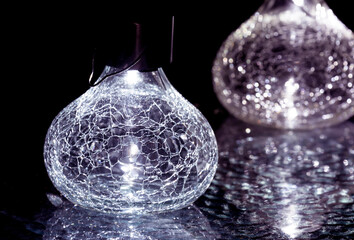 Decorative light bulbs in the garden at night.
