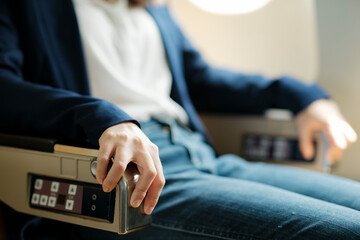 Close up photo of hands business woman In a plane.