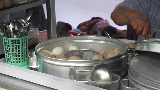 Pentol is a type of snack which can be found in Indonesia. Bakso or baso is an meatball from indonesia. it's a type of meatballs with flour, usually given with soy sauce and sambal.
