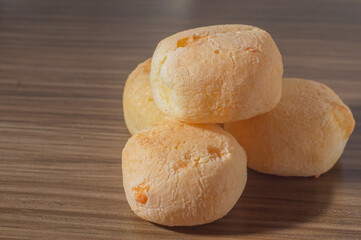 Cheese buns on a wooden table with copy space,traditional Brazilian 