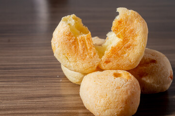 Cheese buns on a wooden table with copy space,traditional Brazilian 