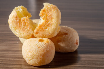 Cheese buns on a wooden table with copy space,traditional Brazilian 
