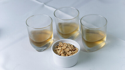 drink with nuts and side dishes