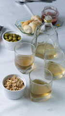 drink with nuts and side dishes