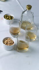 Fototapeta na wymiar drink with nuts and side dishes
