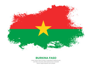 Vintage grunge style Burkina Faso flag with brush stroke effect vector illustration on solid background
