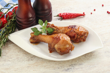 Roasted chicken legs with spicy sauce