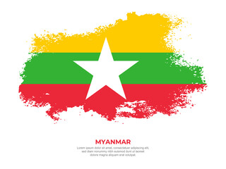 Fototapeta premium Vintage grunge style Myanmar flag with brush stroke effect vector illustration on solid background