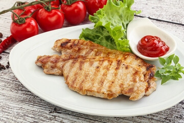 Grilled pork steak with ketchup