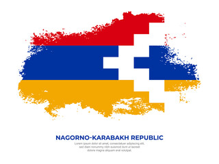 Vintage grunge style Nagorno-Karabakh Republic flag with brush stroke effect vector illustration on solid background