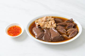 stewed duck offal in brown soup