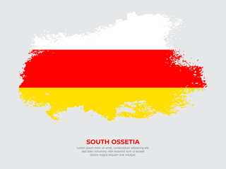 Vintage grunge style South Ossetia flag with brush stroke effect vector illustration on solid background