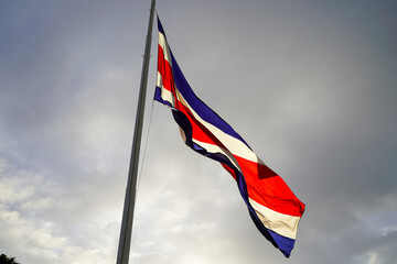 Beautiful view the Costa Rica Flag waving dramatically in the sky