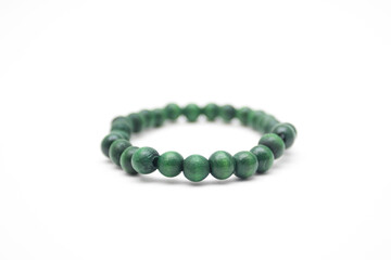 Green wooden bracelet on the arm