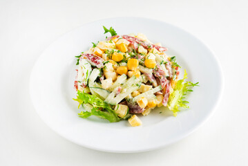 salad with corn on the white plate