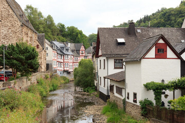 Fototapeta na wymiar Eifel village Monreal with half-timber houses and river Elsbach, Germany