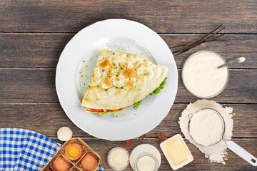 Tasty sandwich with vegetables, ham and cheese, traditional restaurant menu dish, food cooking recipe book cover.