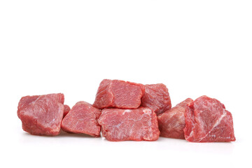 Pieces of veal isolated on white background. Copy space.