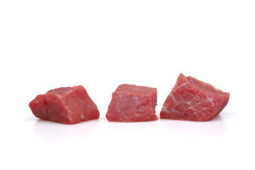 Several pieces of beef isolated on a white background
