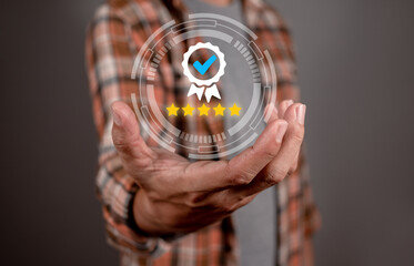 Hand shows the sign of the top service Quality assurance, Guarantee, Standards, ISO certification...