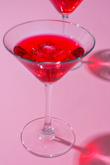 Cold and refreshing cocktails on color background