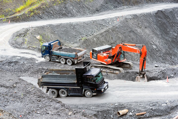 Open pit quarry, dump truck carrying gravel: construction industry © KnoB