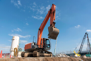 Excavator digging the ground: civil engineering work