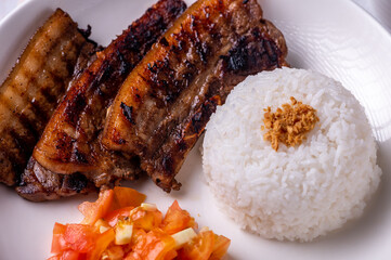 Inihaw na Liempo-Grilled Pork Belly with tomato and vinegar dip on the side