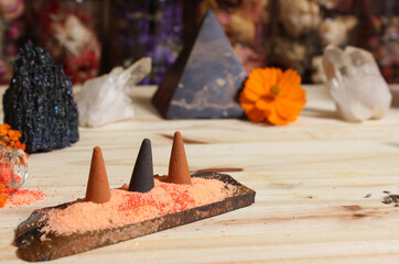 Aragonite Crystal With Incense and Stone Pyramid on Meditation Altar