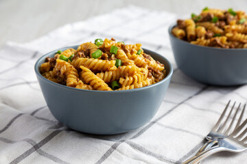 Homemade One-Pot Cheeseburger Pasta in Bowls, side view.
