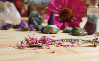 Dried Flowers and Crystal Stones on Meditation Altar Shallow DOF