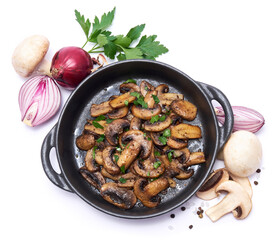 black ceramic bowl with fried mushrooms isolated on white background
