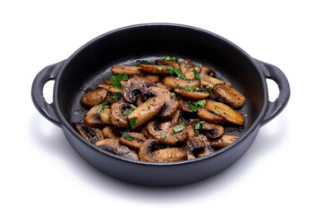 black ceramic bowl with fried mushrooms isolated on white background