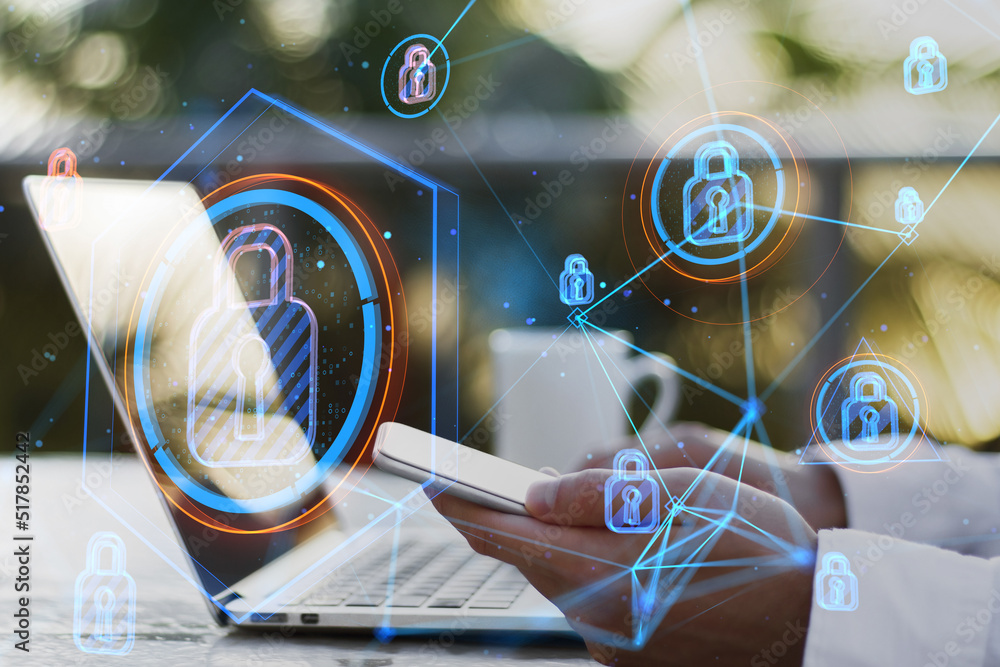 Poster businessman hands using laptop and smartphone at desktop with coffee cup and abstract glowing connec