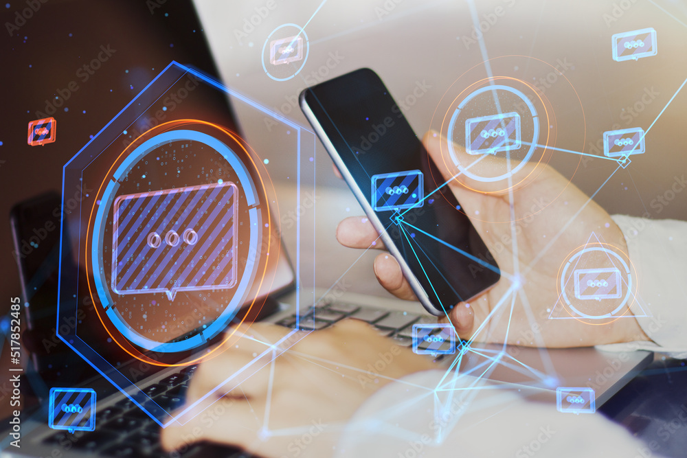 Poster Close up of businessman hands using smartphone and laptop with creative glowing connected communication hologram on blurry background. Technology and wireless networking concept. Double exposure.