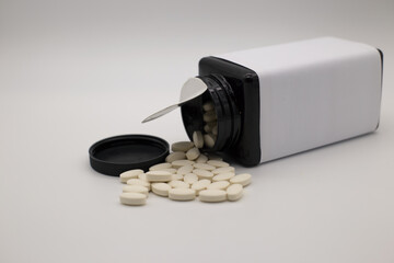 pills and bottles on a white background,Include Clipping Path.