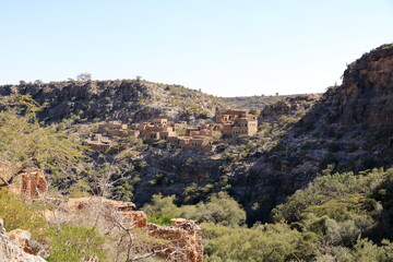 Fototapeta na wymiar View of ruins of an abandoned village at the Wadi Bani Habib at the Jebel Akhdar mountain in Oman