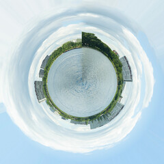 Aerial summer city view with river,park,cityhouses, buildings, parks. Little planet sphere mode. Spherical panorama of the city, little planet. Moscow, Russia