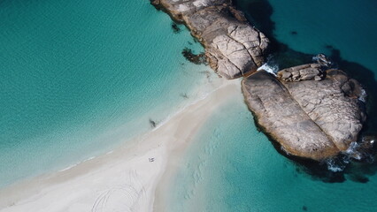 Aerial picture of two beaches in south-west Australia. Island landscape with clear blue water in Wylie Bay, Esperance, Western Australia. Rocks, sand, beach and ocean view from above. 
